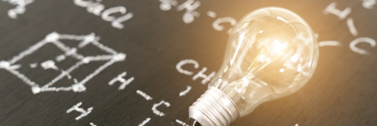 Why Being an Autistic Genius Often Isn't a Good Thing Idea concept with light bulb..