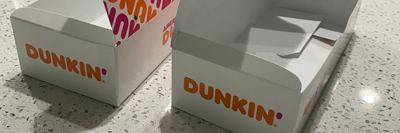 What Donuts Taught My Son With Down Syndrome About Independence Boxes of Dunkin Donuts.