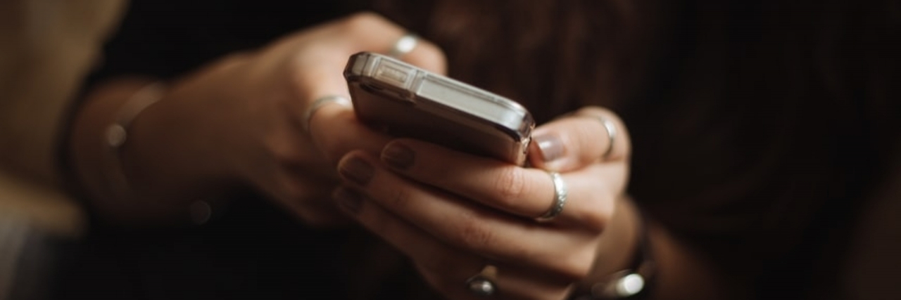 8 Apps That May Help Maintain Your Mental Health Close-up photo of a hands holding a cell phone