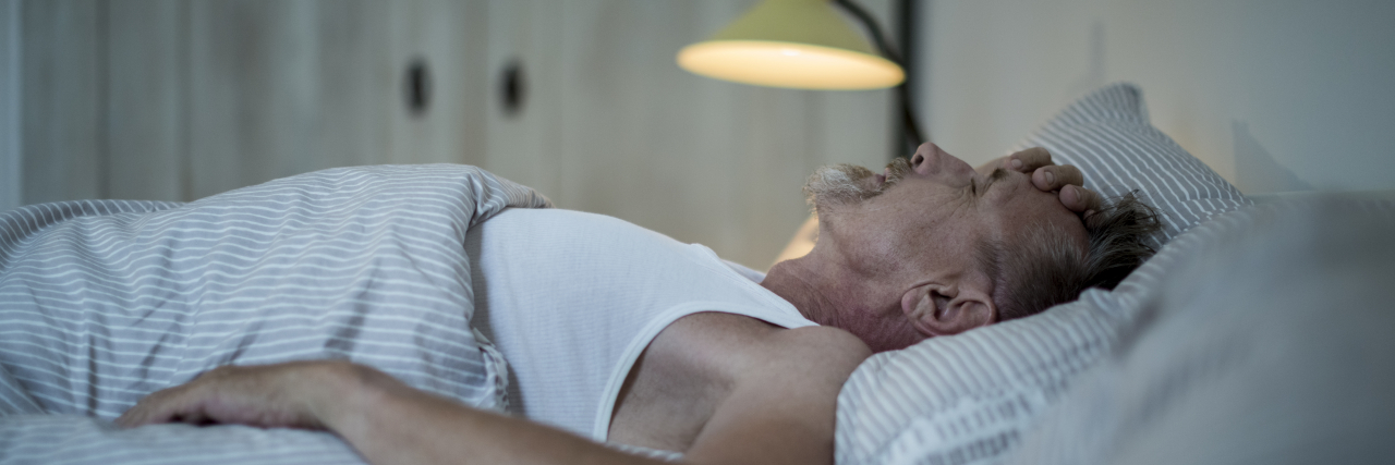 How a Familial Mediterranean Fever Attack Affects Your Day Man sick in bed.
