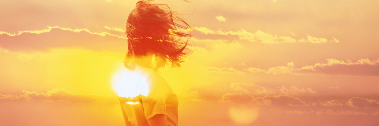 6 Strategies for Healing in Eating Disorder Recovery Double exposure of woman and sunset sky.