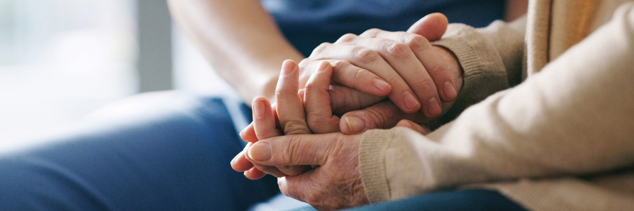 Senate Passes Bill to Create National Support for Family Caregivers Cropped shot of a senior woman holding hands with younger woman