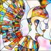 Stained glass image of a person's head made of colorful shards of broken glass