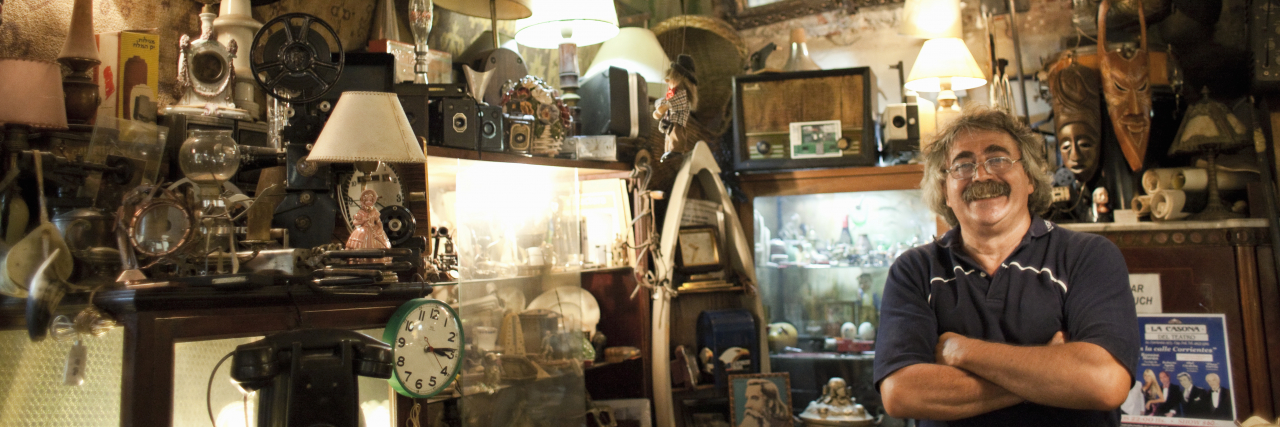 Antique store owner in his shop.
