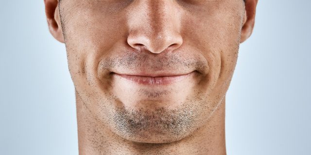 Mouth of man, close up.