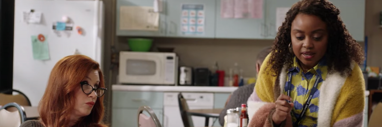 'Abbott Elementary' Shows How 'Gifted Child' Programs Can Cause Harm A screen cap from "Abbott Elementary", where Janine is talking to Ms. Schemmenti. They're in a teacher's break room and Janine is wearing a striped sweater.