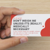 Hand holding "Don't Weigh Me" card