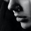black and white close up photo of a woman's tears and lower face