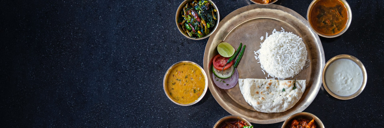 The Emotional Toll of Chronic Illness-Related Dietary Restrictions Assortment of Indian food dishes.