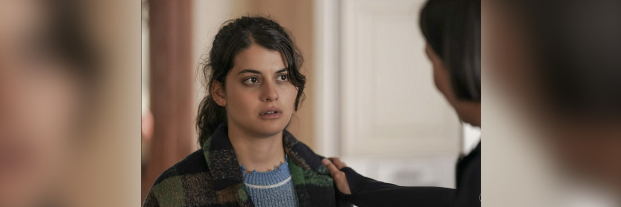 Sofia Black-D’Elia in "Single Drunk Female" looking disheveled, with another character's hand on her shoulder