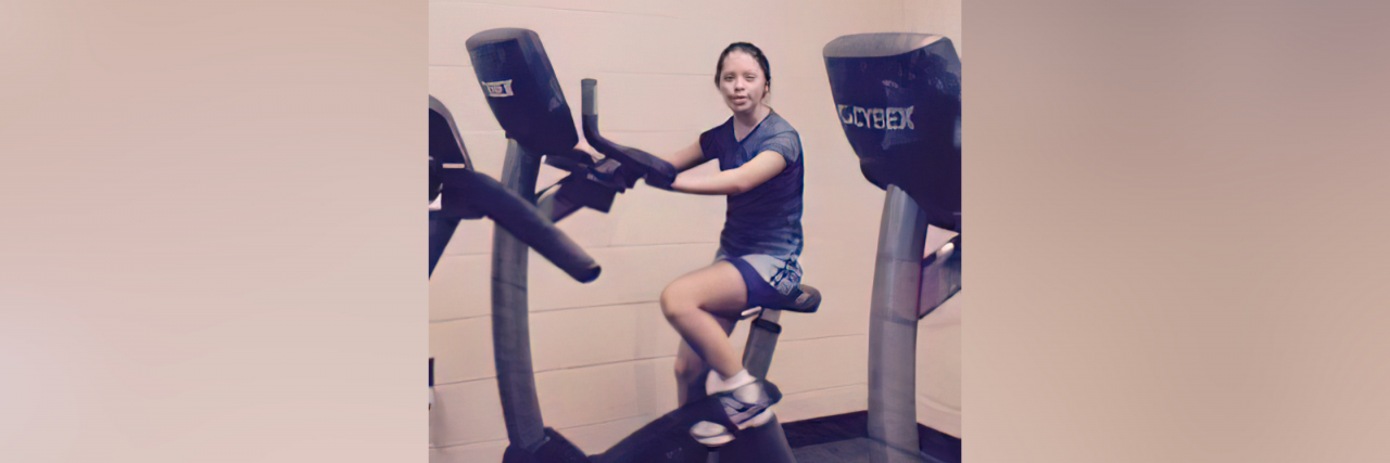 The Infinite Benefits of Including Students With Disabilities Yassy riding an exercise bike.