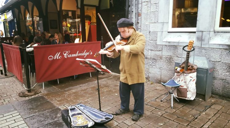 Fionn Angus playing the fiddle.