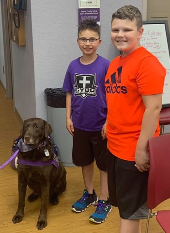 Ruby visiting kids with epilepsy.