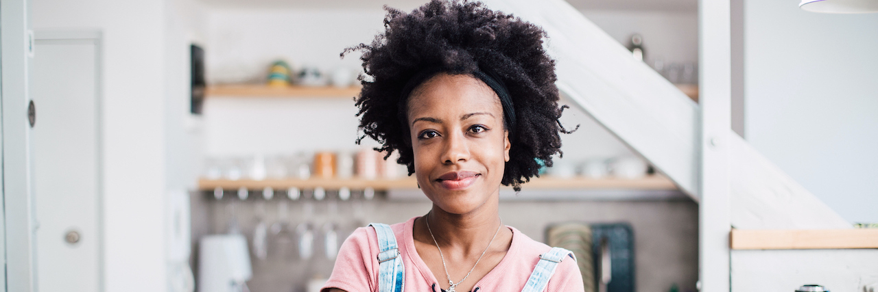 Finding Healing With Masturbation After Abuse, Trauma and Shame Portrait of a Black woman standing and looking into the camera at home