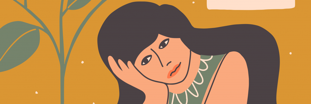 Why NOT Doing Something Can Take So Much Energy With Chronic Illness Tired woman sitting at table resting head on hand.