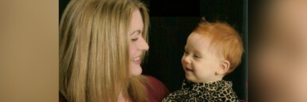 The Trauma of Adoption and Being a Birth Mother Contributor Jacquelyn looking at her infant daughter and both smiling