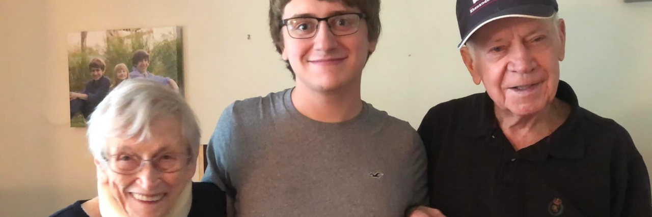 My Autistic Child Is Helping Me Through My Father's Death The author's son with his grandparents.