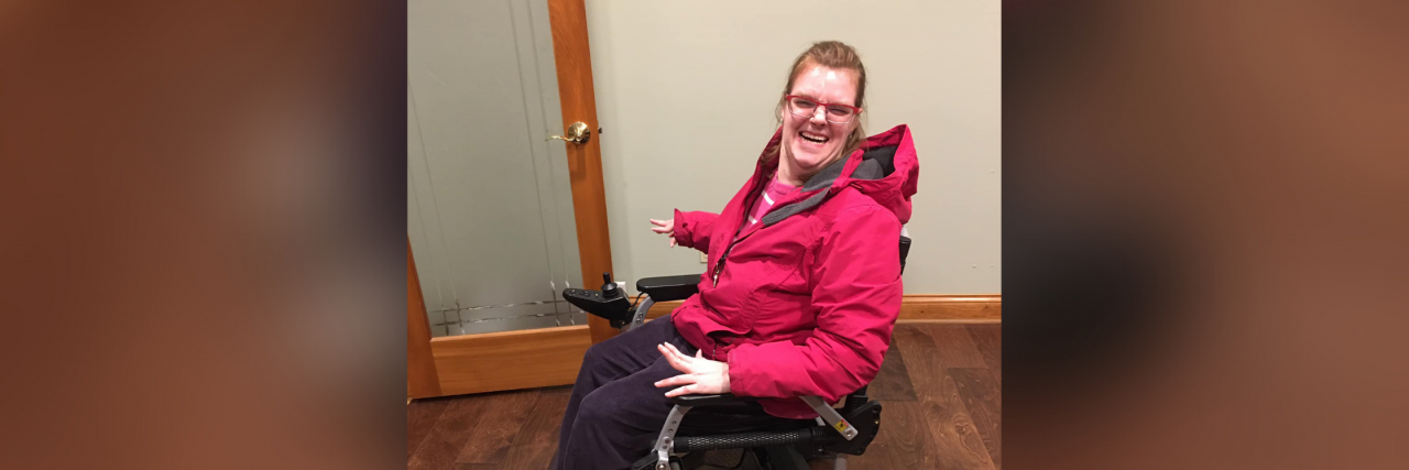 Part-Time Wheelchair Use as an Ambulatory Person With Cerebral Palsy Grace sitting in her power wheelchair.