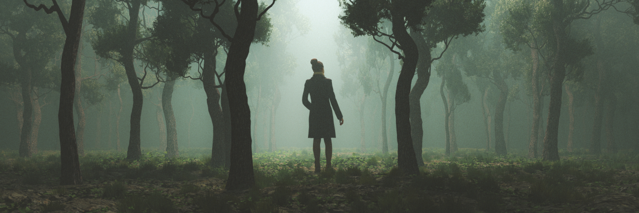 What Medical School Misses About Schizoaffective Disorder photo of a shadowy woman in a forest