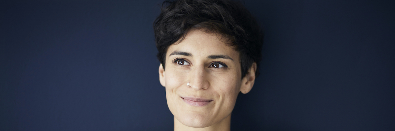 I’m Done Apologizing for Functional Neurological Disorder Portrait of woman with short hair slightly smiling