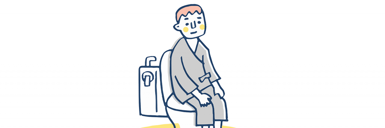 Man sitting on toilet..