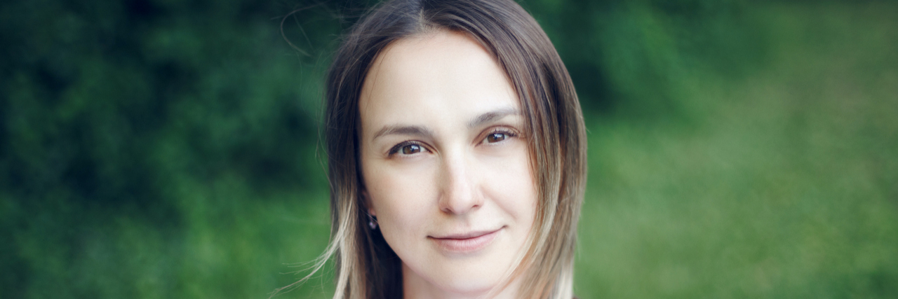 Borderline Personality Disorder Doesn’t Make Someone Bad Person Woman looking calmly ahead while standing outside