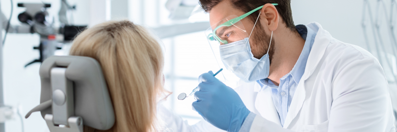 How Long-Term Hospitalization Can Severely Impact Dental Health Dentist treating patient