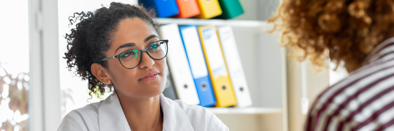 13 Questions You Should Ask Your Doctor If You Have Migraine Woman consulting female doctor.