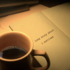On a page there are typed words "Long story short I survived" with a mug of coffee next to it.