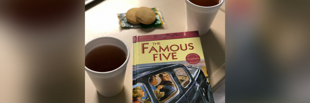 How Hospital Rituals Can Create Familiar Rhythms for Kids and Adults Cookies, tea, and Famous Five book on a hospital tray.