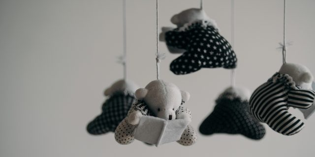 Image of small stuffed animals on baby mobile