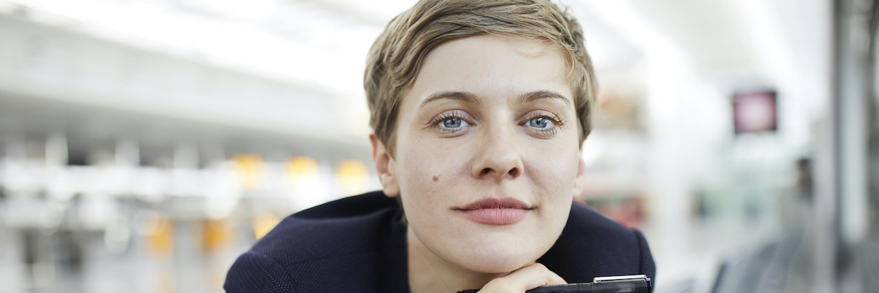 The Importance of Early Intervention for Eating Disorders Woman with short hair looking over back of chair