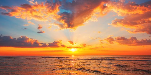 How I’ve Struggled With Spirituality After a Medical Trauma That Led to Disability Beautiful sunset over the tropical sea.