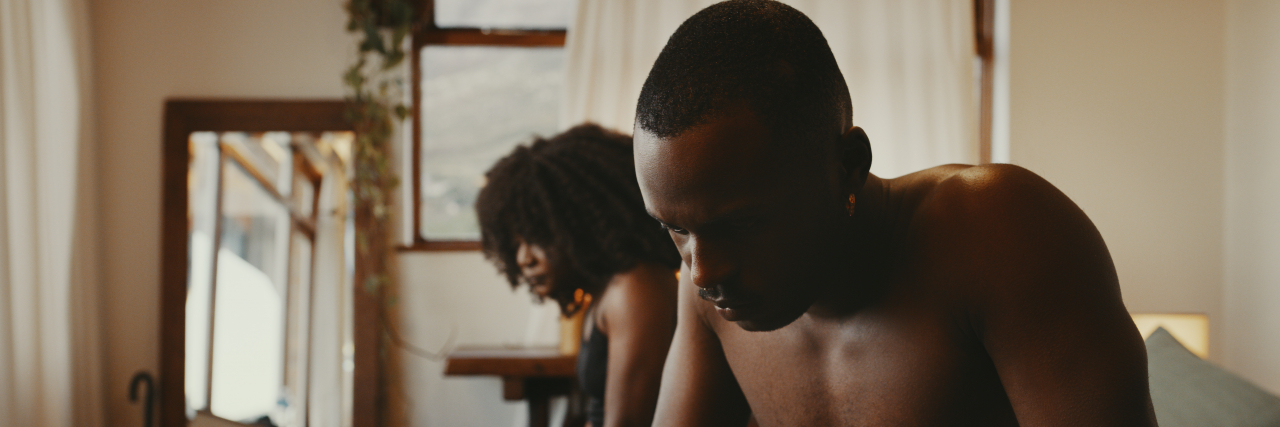 A Love Letter to Black Folk Who Are Struggling After the Buffalo Massacre Shot of a young couple having an argument in the bedroom at home