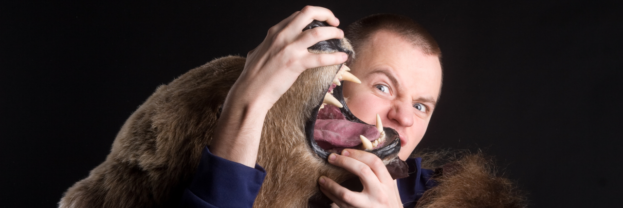 What Fibromyalgia Actually Feels Like Man wrestles with bear.