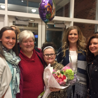 Rachel with teachers and family.