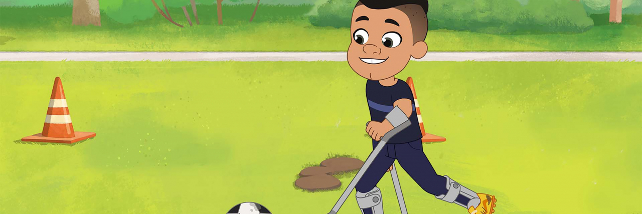 Eddie, a young boy with brown hair and brown eyes runs with crutches to kick a soccer ball.