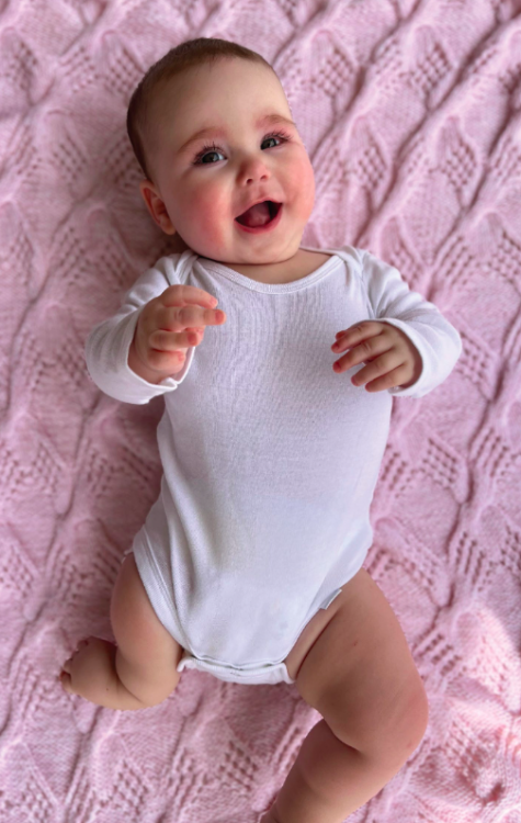Baby Isa, who won the 2022 Gerber baby photo contest, and who has a limb difference 