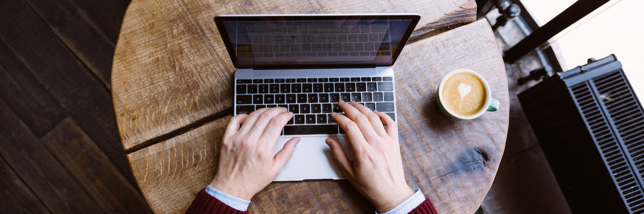 Rejection Sensitive Dysphoria and Fear of Failure Following My Dreams Directly above view of a man's hands and arms, working on laptop on round table, with coffee mug next to him
