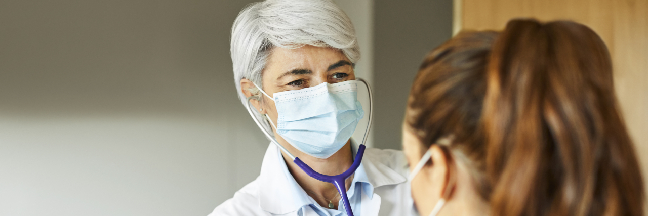 How to Be Your Own Best Advocate With Long COVID Doctor examining female patient