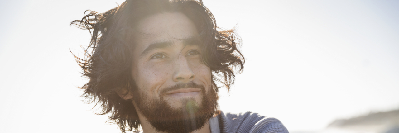 How Ankylosing Spondylitis Helped Me Learn to Love My Body Man in the sunshine.