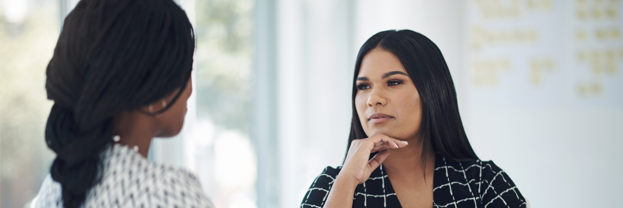 What to Say If Someone Doesn't Believe Your Fibromyalgia Pain Is Real Two women having a serious conversation about fibromyalgia