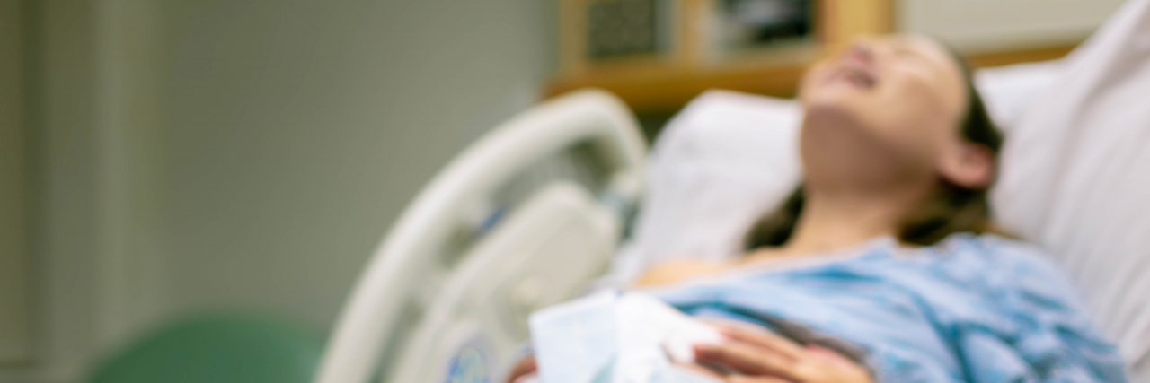 Pregnancy With a Chronic Illness Made Me Even More Pro-Choice A woman in labor,