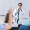 Teacher speaking to medical school students about fibromyalgia.