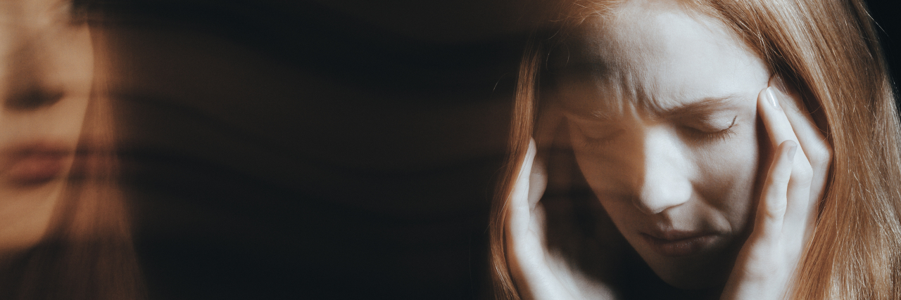 How the Roe v. Wade Reversal Has Triggered My PTSD From Sexual Abuse Woman experiencing traumatic memories.