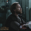 Obi-Wan Kenobi holding a young princess Leia