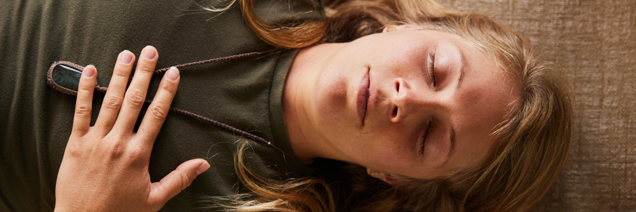 Useful Distress Tolerance Techniques and How to Use Them photo of a woman doing breathing exercises