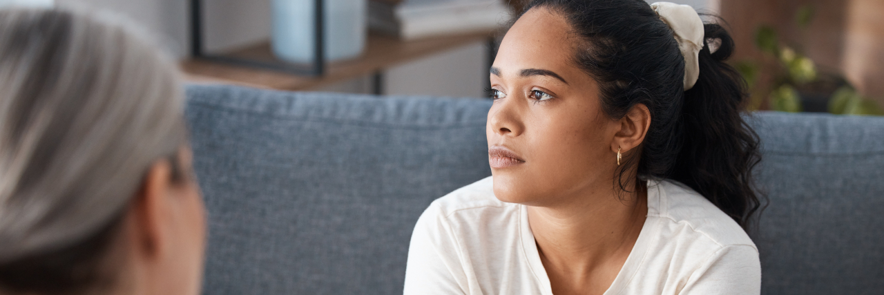 What the End of Roe v. Wade Does (and Doesn't) Mean for Your Relationship With Your Therapist Woman discussing abortion with therapist