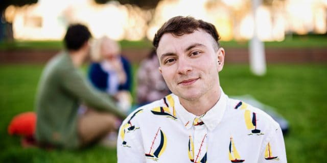 Young transgender man looking at the camera