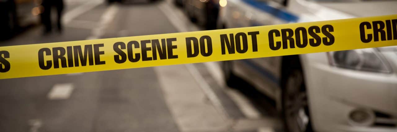How to Avoid 'Trauma Porn' and Exploitative True Crime Documentaries Crime scene tape and police cars.